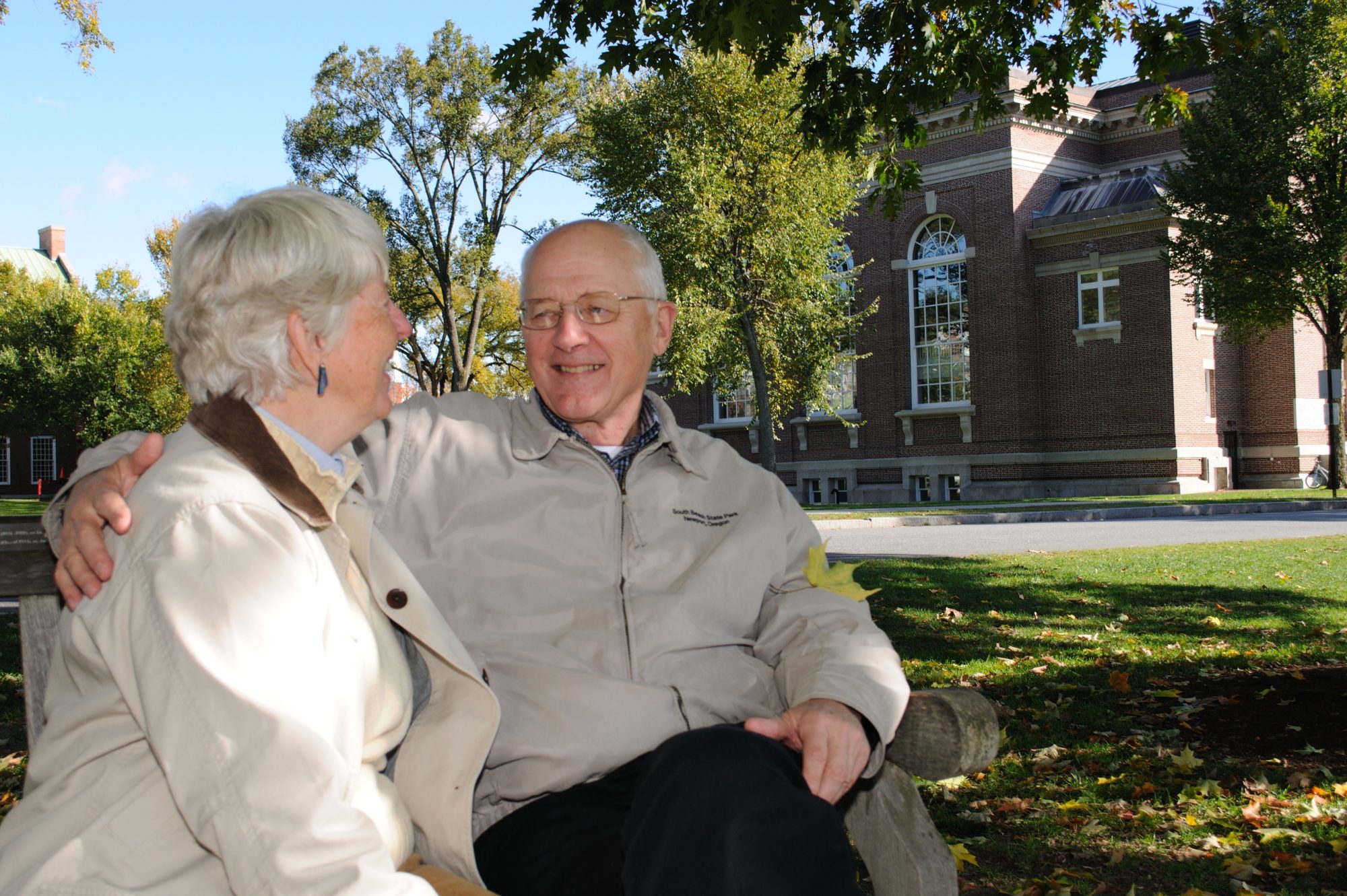 Couple sits on bench in downtown Hanover
